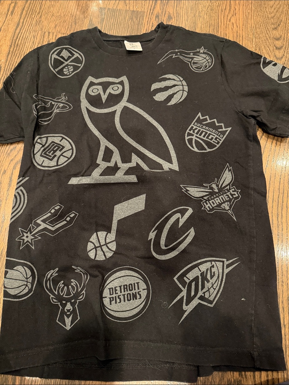 OVO Black Tee with Gray NBA Logos
